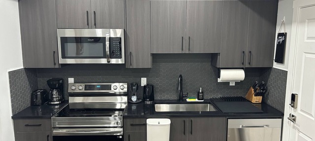 Charming 1-Bedroom Basement Walkout Suite with a Gym and Office. in Calgary