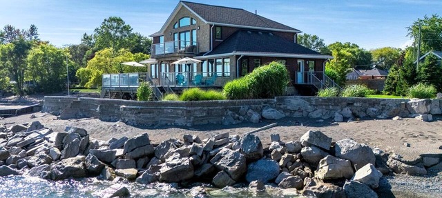 Luxury Waterfront Estate with Beach Access and Expansive Grounds in Ontario, Canada in Wheatley