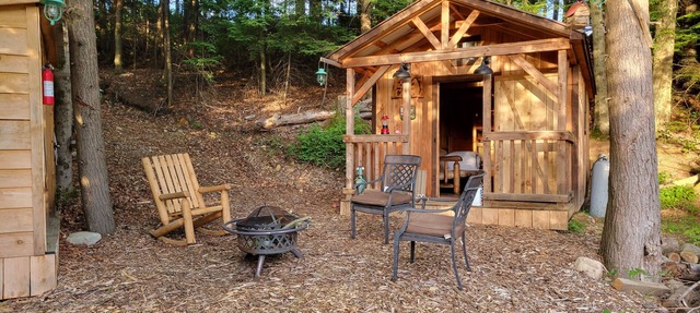 Off Grid Cabin nestled in the woods next to a stream at the base of Tug Hill in Rome