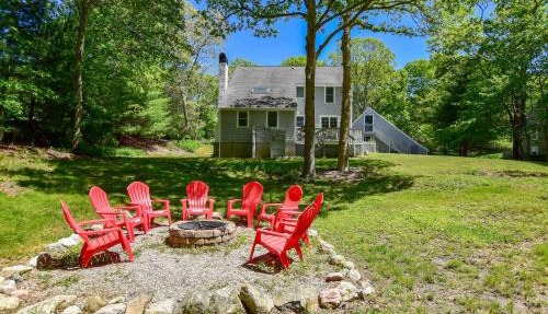 Spacious Stone Fire Pit Game Room in Barnstable