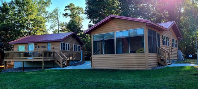 Two cabins right on the lake, including shared game room! in Backus