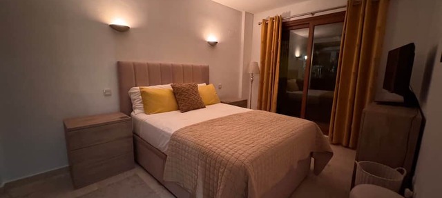 "Spacious ground floor apartment" with Shared Pool, Terrace & Wi-Fi in Punta Prima