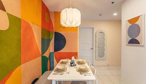 Stylish 2BR Condo with Rooftop Views & Gym Near Downtown & Airport in Montreal
